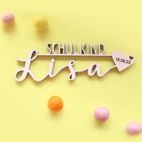 Schulkind mit Namen und Datum